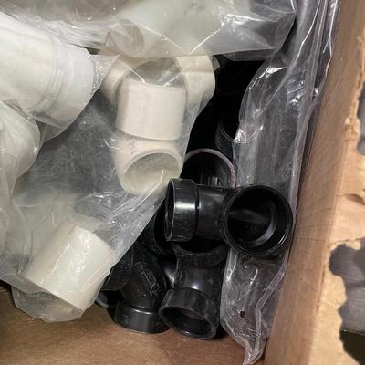 Box of PVC pieces - look to be 1-1/2" assorted pieces - elbows, corners, etc