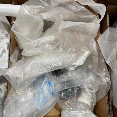 2 Boxes of plumbing connection pieces - 1", 1-1/2" lots of bags
