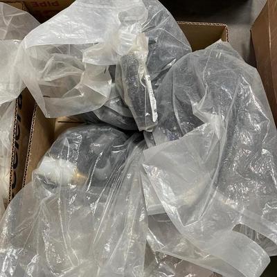 2 Boxes of plumbing connection pieces - 1", 1-1/2" lots of bags