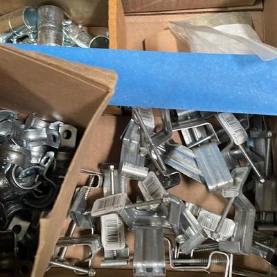 Box of Pipe Clamps & Metal Strapping