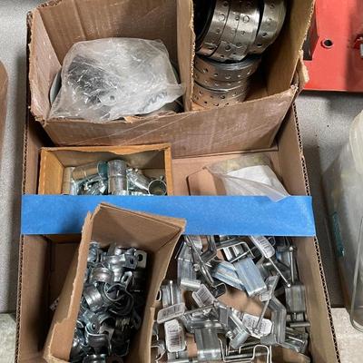 Box of Pipe Clamps & Metal Strapping