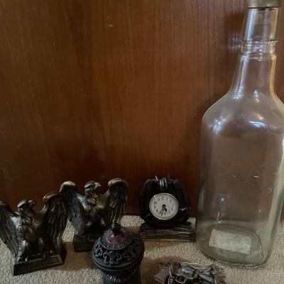 Tall glass bottle, Eagle bookends clock and more