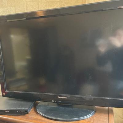 Panasonic TV and DVD player along with DVDs