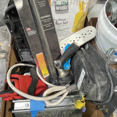 Lot of Misc. Items - floor cleaning pad, blue flame light, 3 pc rain suit, power strip, shoe spikes & More