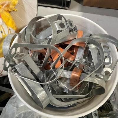 Box of Metal Clamps - maybe for fence or plumbing use