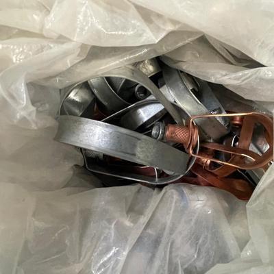 Crate of metal clamps