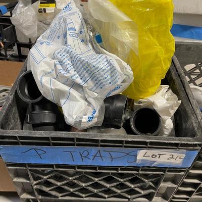 Crate of various plumbing pipe pieces - plastic and galvanized P-Traps & more