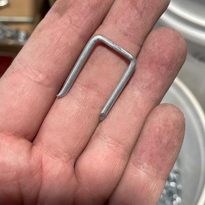 Bucket full of 9/16" staples