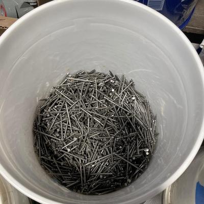 Bucket of new framing Nails