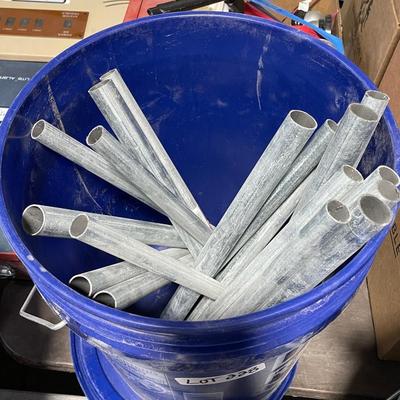 Bucket of Galvanized conduit/pipe pieces