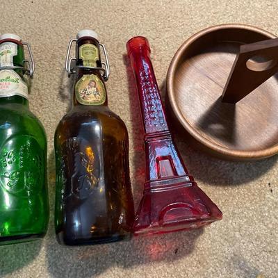 Vintage beer bottles and wooden holder