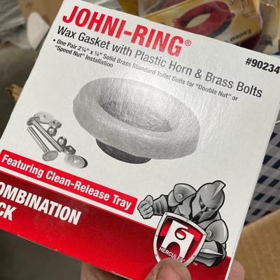 Box of Plumbing Supplies - Toilet Rings, sink components