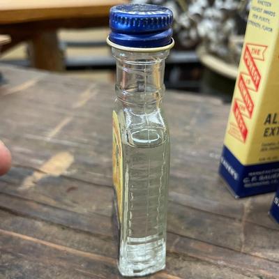 Set of Four Vintage Bottles of Sauer's Almond Extract Lot Two
