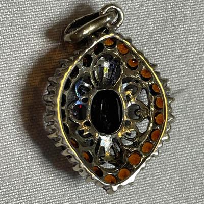 CAN Thai Sterling Pendant with Garnets