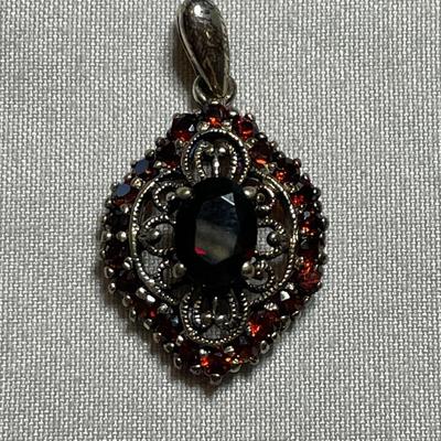 CAN Thai Sterling Pendant with Garnets