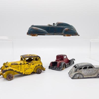 Four Antique Diecast Cars