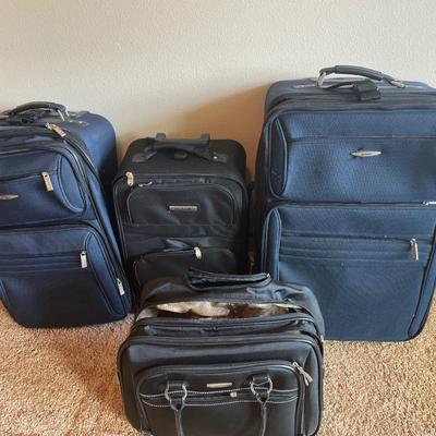Assortment of luggage items