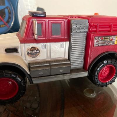 Toy trucks, Craig weather radio and thermometer