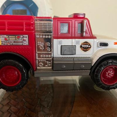 Toy trucks, Craig weather radio and thermometer
