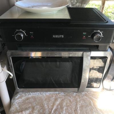 Small kitchen Apliance lot all seen on shelves and table