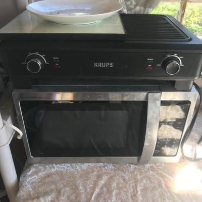 Small kitchen Apliance lot all seen on shelves and table