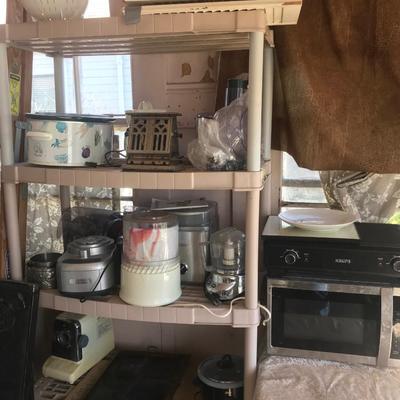 Small kitchen Apliance lot all seen on shelves and table