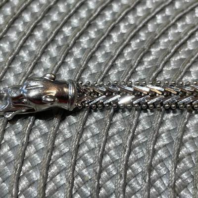 Vintage Sterling Silver 7" Long 1/4" Wide Panther/Animal Head Bracelet in VG Preowned Condition as Pictured.