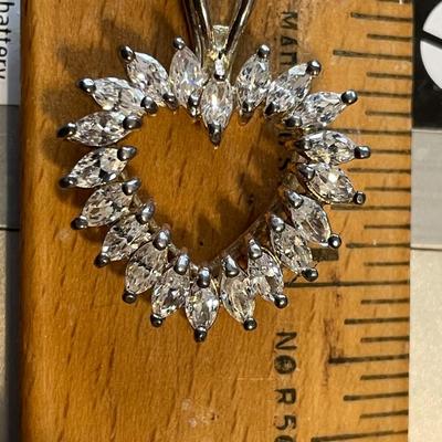 Vintage Sterling Silver Graduated Marquise Shaped CZ Heart Pendant on a 22" Chain in VG Preowned Condition as Pictured.
