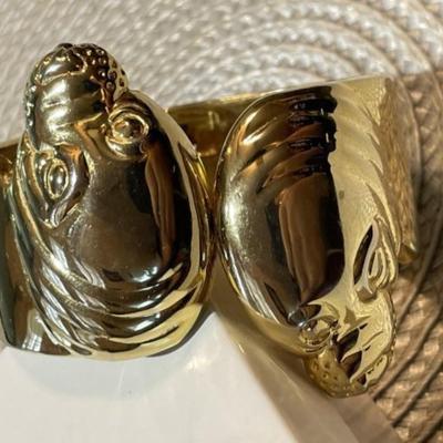 Ladies Hinged Gold-tone Color Sea Lion Fashion Spring Loaded Cuff Bracelet 1"-1.5" in VG Preowned Condition.