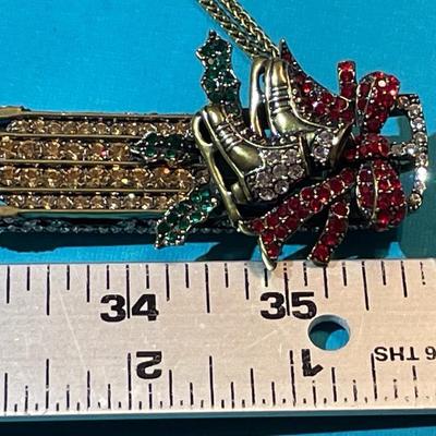Vintage Christmas Sled Rhinestone Fashion Pin or Pendant on/24" Chain in VG Preowned Condition.