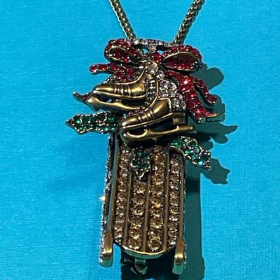 Vintage Christmas Sled Rhinestone Fashion Pin or Pendant on/24" Chain in VG Preowned Condition.