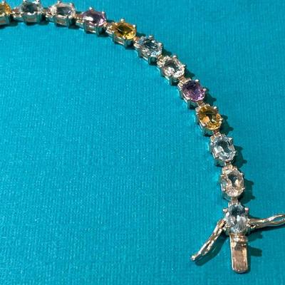 Vintage Sterling Silver Multi-Colored Semi-Precious Stones Fashion Tennis Bracelet 8" Long in VG Preowned Condition.