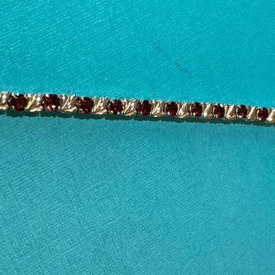 Vintage Sterling Silver Garnet Stones Fashion Tennis Bracelet 8" Long in VG Preowned Condition.