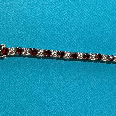 Vintage Sterling Silver Garnet Stones Fashion Tennis Bracelet 8" Long in VG Preowned Condition.