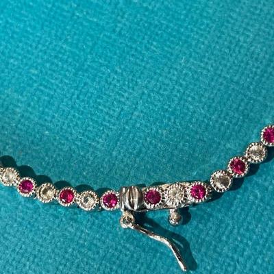 Vintage Dainty DL Designer Sterling Silver Ruby CZ Stones Fashion Tennis Bracelet 7.5" Long in VG Preowned Condition.