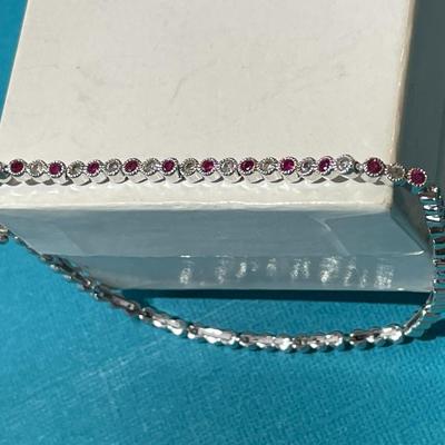 Vintage Dainty DL Designer Sterling Silver Ruby CZ Stones Fashion Tennis Bracelet 7.5" Long in VG Preowned Condition.