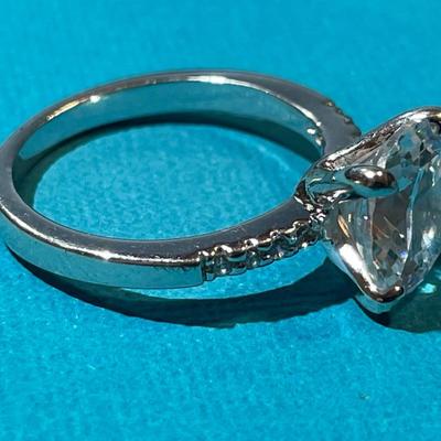 Vintage Silver-toned Fashion CZ Engagement Style Ring w/Center CZ Stone Measuring about 1.75 Carats in VG Preowned Condition.