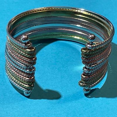 Vintage Dozen Strand Multi-Color Designer Cuff Fashion Bracelet in Very Good Preowned Condition.