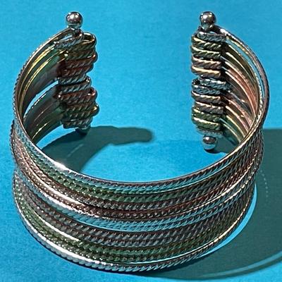 Vintage Dozen Strand Multi-Color Designer Cuff Fashion Bracelet in Very Good Preowned Condition.