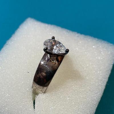 Vintage Sterling Silver CZ Engagement Style Ring Size-8 w/Pear Shaped Center CZ Stone Measuring about .85-Carats in VG Preowned Condition.