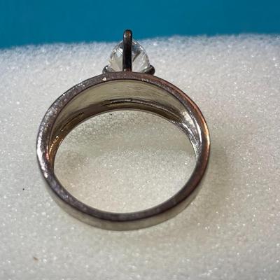 Vintage Sterling Silver CZ Engagement Style Ring Size-8 w/Pear Shaped Center CZ Stone Measuring about .85-Carats in VG Preowned Condition.