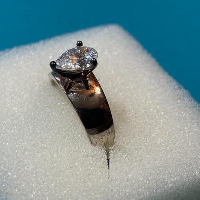 Vintage Sterling Silver CZ Engagement Style Ring Size-8 w/Pear Shaped Center CZ Stone Measuring about .85-Carats in VG Preowned Condition.