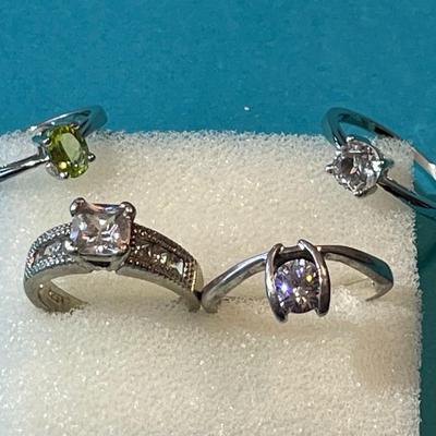 Lot of 4-Vintage Sterling Silver CZ Rings in VG Preowned Condition as Pictured.