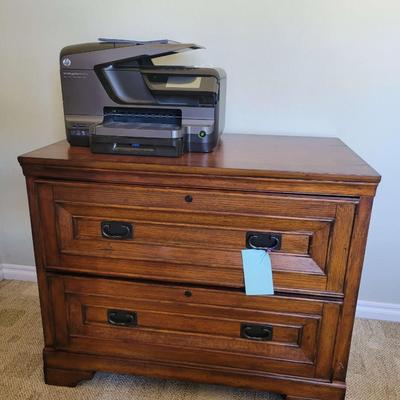 Lateral cabinet and printer