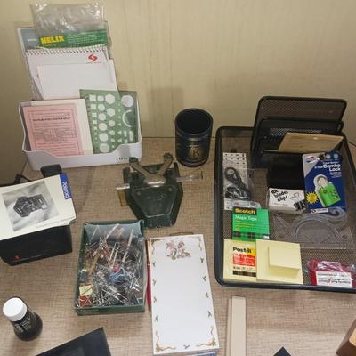 OFFICE SUPPLIES AND A POLAROID CAMERA