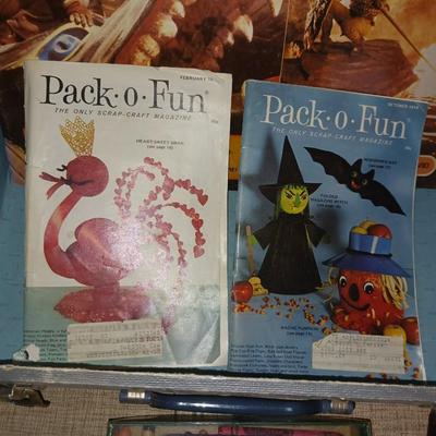 CHILDREN'S ACTIVITY BOOKS AND A SMALL CASE TO CARRY THEM