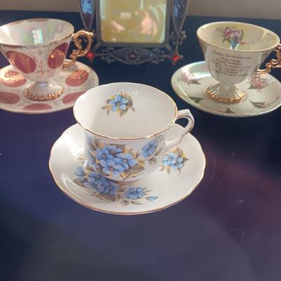 3 VINTAGE CUPS AND SAUCERS PLUS A BEAUTIFUL FRAME