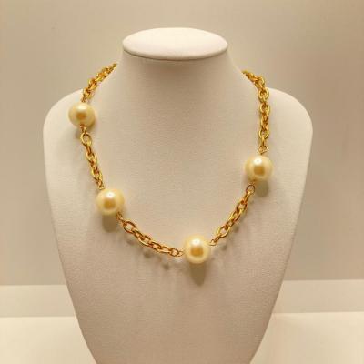 LOT 61: Multi Strand Gold Tone Necklaces, Faux Pearls & More