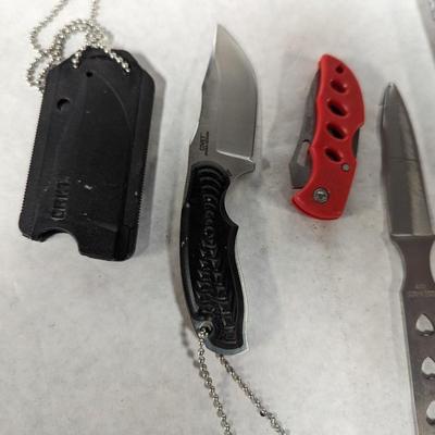 Assortment Of Knives Rope Stone