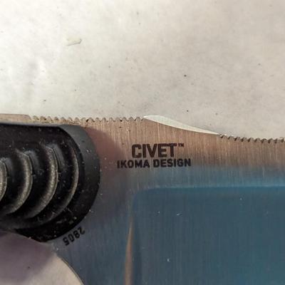 Assortment Of Knives Rope Stone